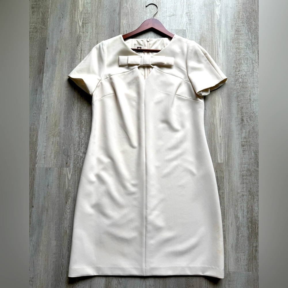Elegant Cream Dress with Bow Detail